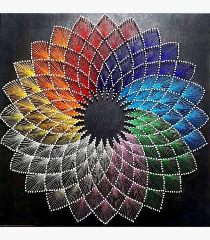 Handcrafted geometric string art mandala on a dark wooden board titled Chromatic Resonance by Asit Trivedi featuring a multi-layered spectrum of rainbow colored threads forming a continuous woven kaleidoscope.