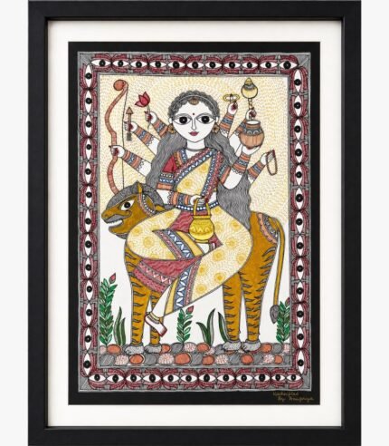 A traditional Madhubani painting on handmade paper depicting ten-armed Goddess Chandraghanta in a cream and red floral sari seated on a striped tiger mount, framed by a protective eye-pattern border by artist Anupriya.