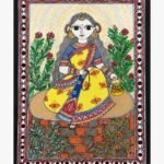A traditional Madhubani painting on handmade paper depicting Goddess Brahmacharini in a yellow and blue sari holding prayer beads and a kamandalu water pot, framed by a protective eye-pattern border by artist Anupriya.