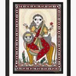 A traditional Madhubani painting on handmade paper depicting four-armed Goddess Katyayani in red and green attire holding a golden curved sword and lotus while seated on a lion mount, framed by a protective eye-pattern border by artist Anupriya.