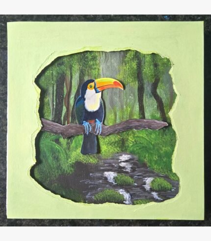 An original 3D paper cut-out and acrylic canvas painting of a colorful toucan perched in a tropical rainforest by artist Jyoti Machigad.