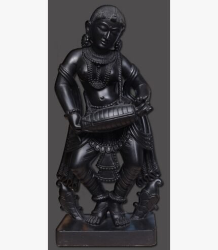 Hand-carved black stone sculpture titled Lady Playing Dholak by Mangalya Stone Panels showcasing a traditional Indian woman musician playing a drum in a classical dancing posture.