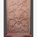Hand-carved Banshi Pahadpur pink sandstone relief panel titled Flower Pot by Mangalya Stone Panels showcasing a symmetrical floral vase design with blooming rosettes and acanthus scrollwork leaves.