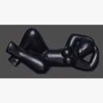 Hand-carved black stone minimalist sculpture titled Reclining Lady by Mangalya Stone Panels showcasing a stylized recumbent female figure with smooth contours.