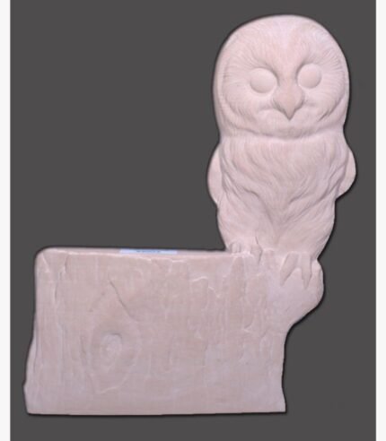 A hand-carved sandstone relief sculpture of an owl with detailed feathers perched on a rustic stone log ledge, showcased against a solid background.