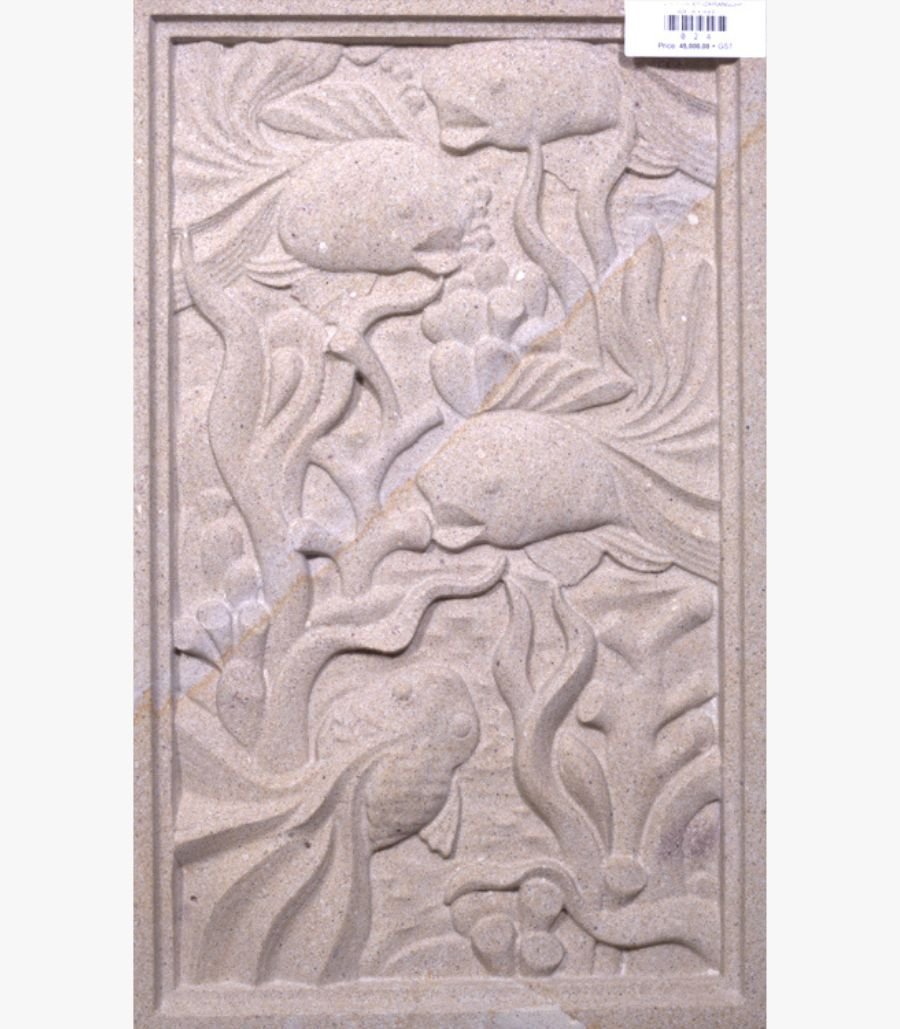 z11 Hand-carved Dhrangadhra beige sandstone vertical relief panel titled Fish Panel by Mangalya Stone Panels featuring swimming fish amidst detailed coral reefs and aquatic sea anemones.