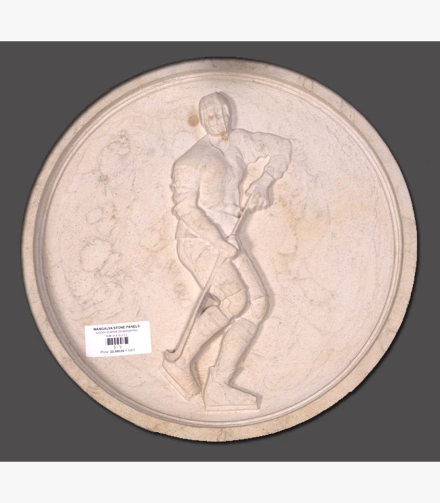 z12 Hand-carved Dhrangadhra beige sandstone circular relief panel titled Hockey Player by Mangalya Stone Panels showcasing an athlete in motion with a hockey stick and ice skates.