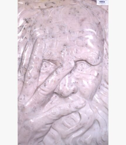 Hand-carved pink marble vertical relief panel titled Peeping Face by Mangalya Stone Panels depicting an expressive elder's face looking through chiseled fingers.