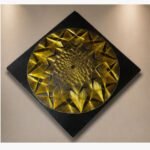 Handcrafted circular golden mandala 3D string art mounted diagonally on a black wooden board by Art Impression.